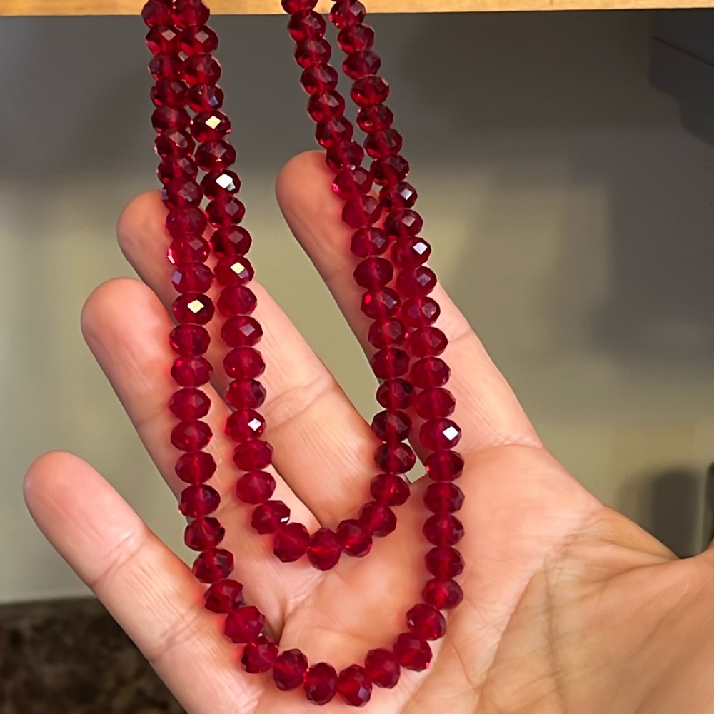 Gorgeous!! Long strand Red Aurora Borealis necklace. Glass crystal.